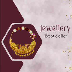 Close-up of a traditional gold Indian nose ring with red and white beads.