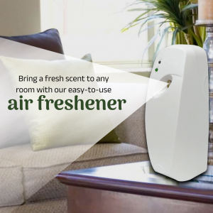 White automatic air freshener dispenser on a table next to a sofa.