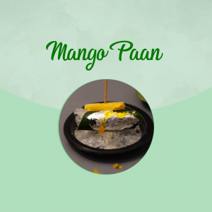 Close-up of a Mango Paan served on a black plate with silver foil and spices.