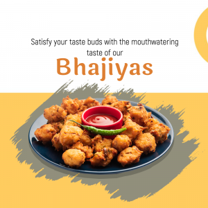 A plate of crispy Bhajiyas with a side of ketchup and green chili.