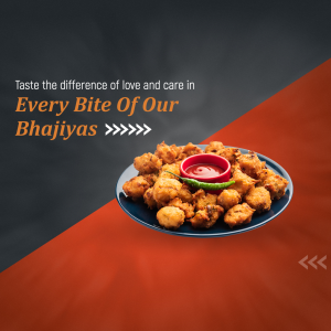 A plate of crispy bhajiyas with a side of ketchup and green chili.