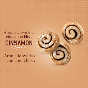 Close-up of three freshly baked cinnamon buns with icing