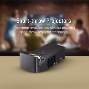 Short-throw projector on a table with people watching a screen in the background