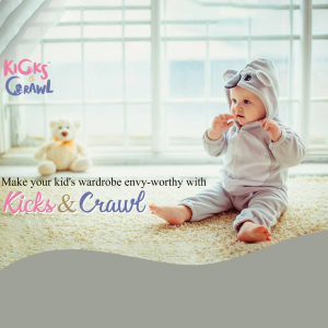 Baby wearing a cute gray animal hooded outfit, promoting Kicks & Crawl clothing brand.