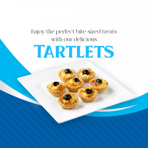 A white square plate with seven golden-brown tartlets topped with blueberries on a blue background.