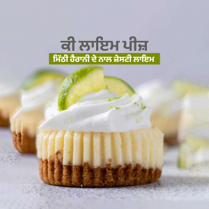 Close-up of mini key lime pies with whipped cream and lime slices.