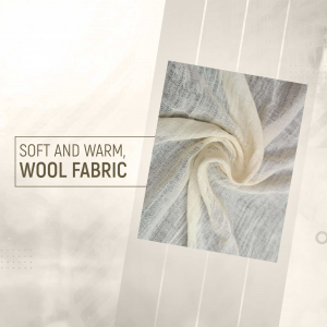 Close-up of a soft, textured wool fabric in shades of white and gray.
