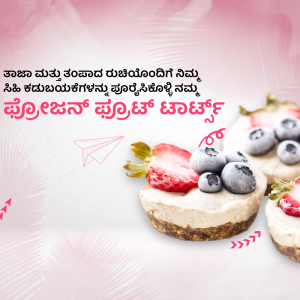 Close-up of mini cheesecakes topped with fresh strawberries and blueberries.