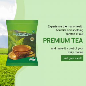 Image of a tea premix packet with a cup of tea and green tea leaves in the background.