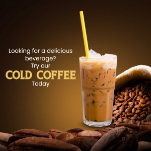 A glass of iced coffee with coffee beans and a straw.