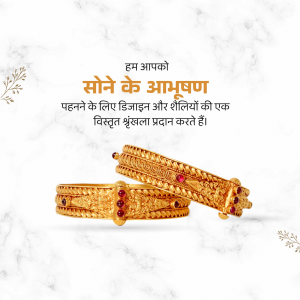 Close-up of intricately designed golden bangles with red stone accents.