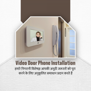 Wall-mounted video door phone with a woman speaking on the handset