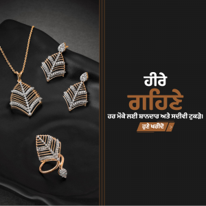 Close-up of a gold and diamond leaf-shaped jewelry set including a pendant, earrings, and ring.