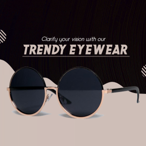 Close-up of stylish round sunglasses with gold frames