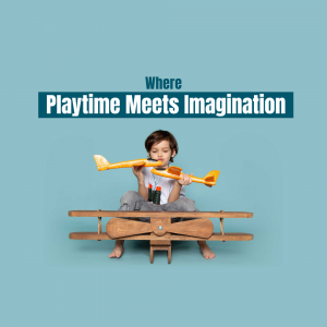 A young boy playing with a toy airplane and wooden airplane prop.