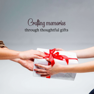 Two people exchanging a gift wrapped in white paper with a red ribbon.