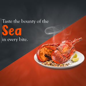 A beautifully presented cooked lobster on a plate with lemon and side dish.