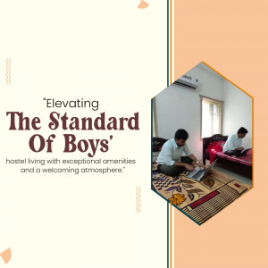 Image of a boys' hostel common room with residents relaxing and using laptops.