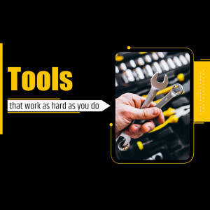 Image of a hand holding a wrench with a toolbox in the background, promoting durable tools.