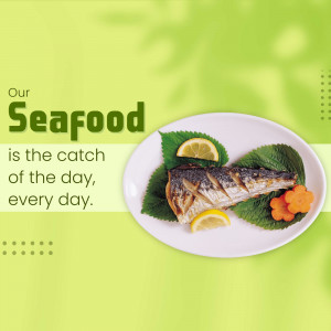 Grilled fish with lemon and vegetables on a white plate