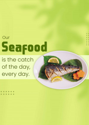 Grilled fish with lemon and greens on a white plate