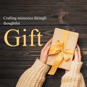 Hands holding a gift box with a yellow ribbon on a wooden surface