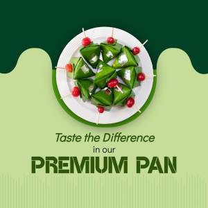 Close-up of beautifully arranged green betel leaf (pan) with cherries on a white plate.