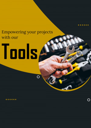 Hand holding wrench with tool assortment in background