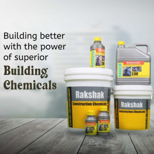Rakshak Construction Chemicals products displayed on a wooden surface