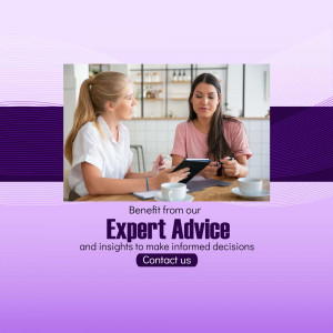 Two women discussing finances with a tablet and coffee.