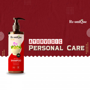 Re-uniQue Rich Ayurvedic Shampoo bottle with product details and branding.