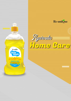 Bottle of Re-uniQue Ayurvedic Dish Wash with yellow and gold background
