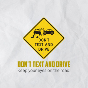 Yellow road sign warning against texting while driving