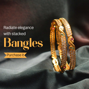 Close-up of gold bangles with red and green stone embellishments
