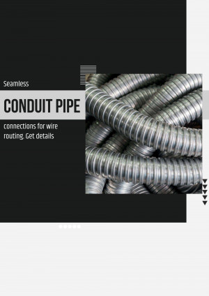 Close-up of coiled galvanized steel conduit pipe for electrical wiring