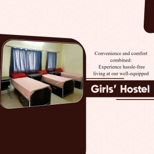 Interior view of a girls' hostel room with beds and furniture