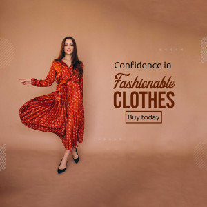 Woman in a flowing orange patterned dress posing for a fashion advertisement.