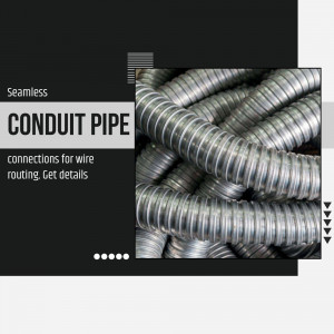 Close-up of coiled galvanized steel conduit pipe for electrical wiring.