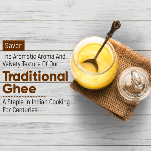 Jar of golden ghee with a spoon on a rustic burlap cloth