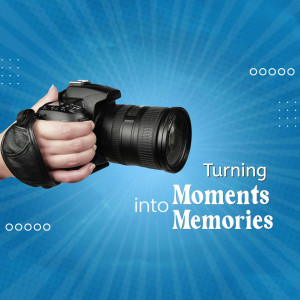 Hand holding a DSLR camera with a blue abstract background and text 'Turning Moments into Memories'