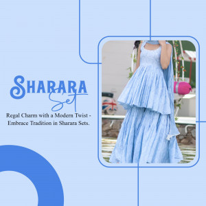 Woman wearing a light blue Sharara set with intricate embroidery.