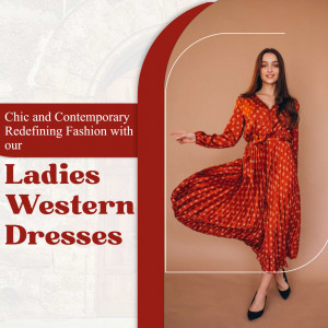Woman in a flowing orange and red patterned western dress