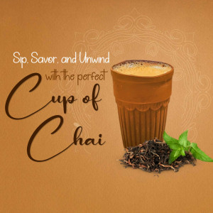 A clay cup of chai with tea leaves and mint