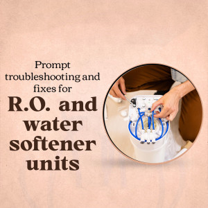 A person repairing a RO water purifier unit with tools.