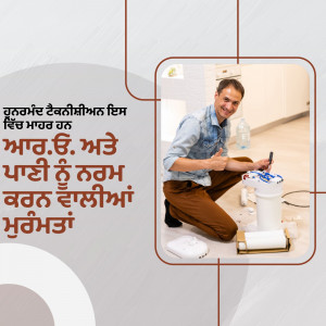 Man installing a water filter system at home