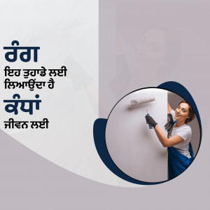 Woman painting a wall with a roller