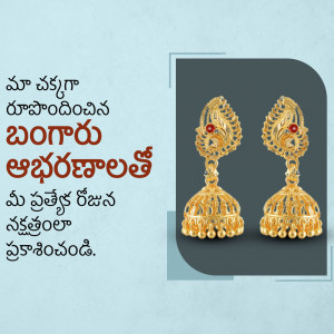 Close-up of ornate gold jhumka earrings with red stone accents.