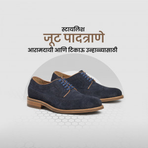 Pair of dark blue leather shoes on a light grey background with text in Marathi