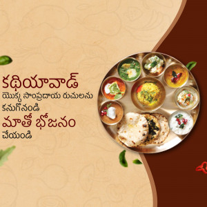 A silver platter filled with various South Indian dishes, including rice, lentils, curries, and bread.