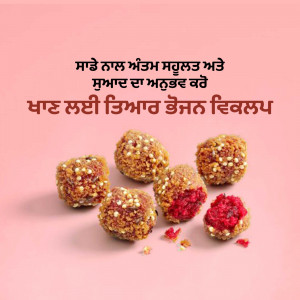 Close-up of traditional Punjabi Gurh Ke Ladoo (jaggery balls) with sesame seeds.
